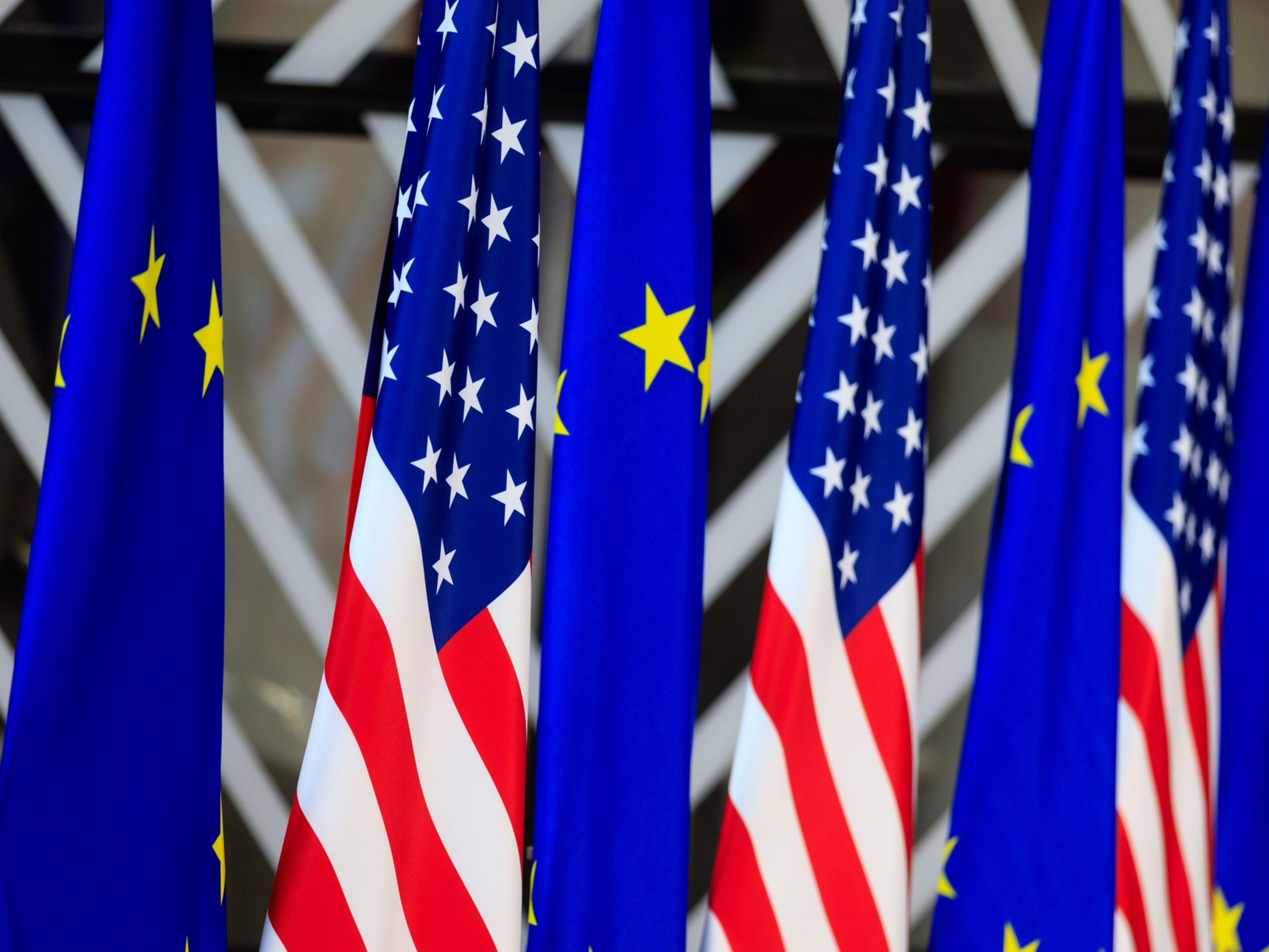 European Union and United States flags stand in a row. Photo: Bloomberg.
