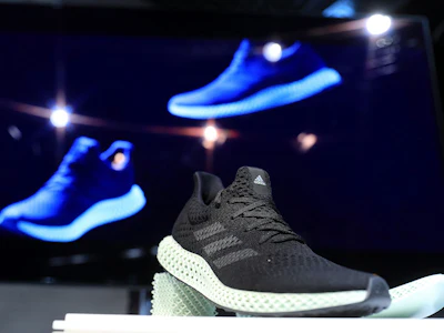 Adidas sneakers on display. Photo: Bloomberg.