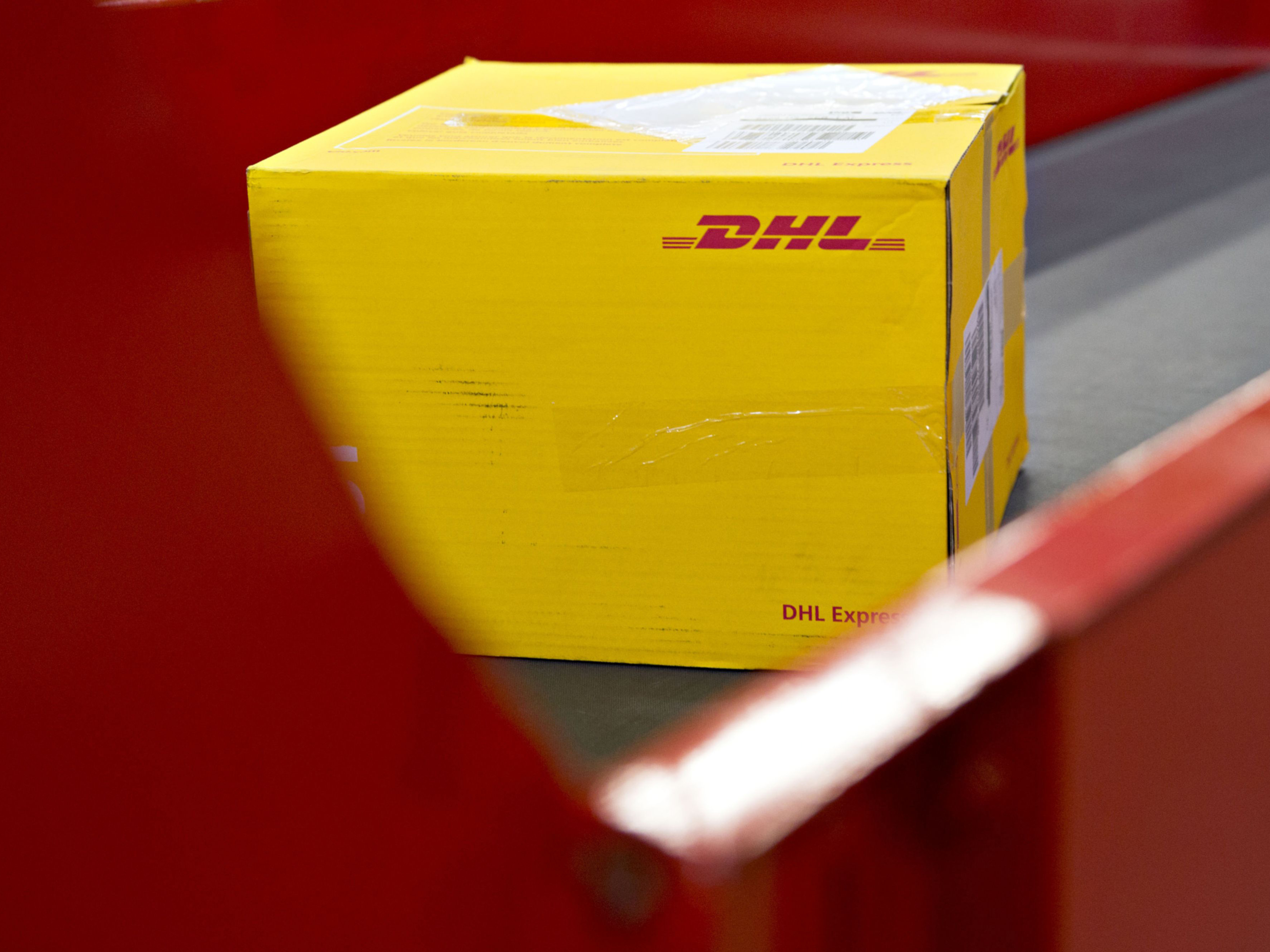 A box travels along a conveyor at a DHL Worldwide Express facility in Chicago, Illinois. Photo: Bloomberg.