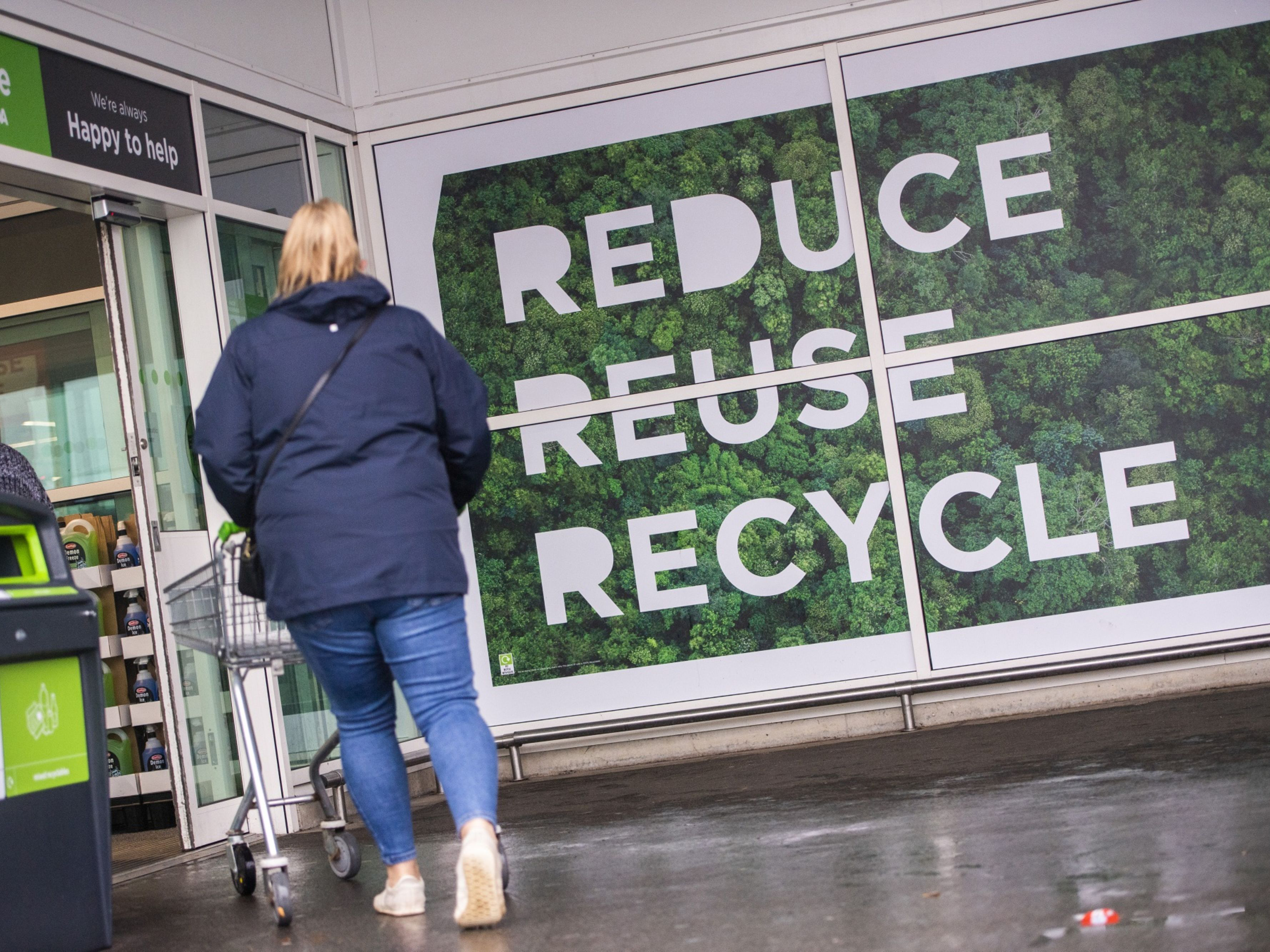 Customers enter an Asda store — formerly owned by Walmart Inc. — trialing new sustainability initiatives. Photo: Bloomberg.