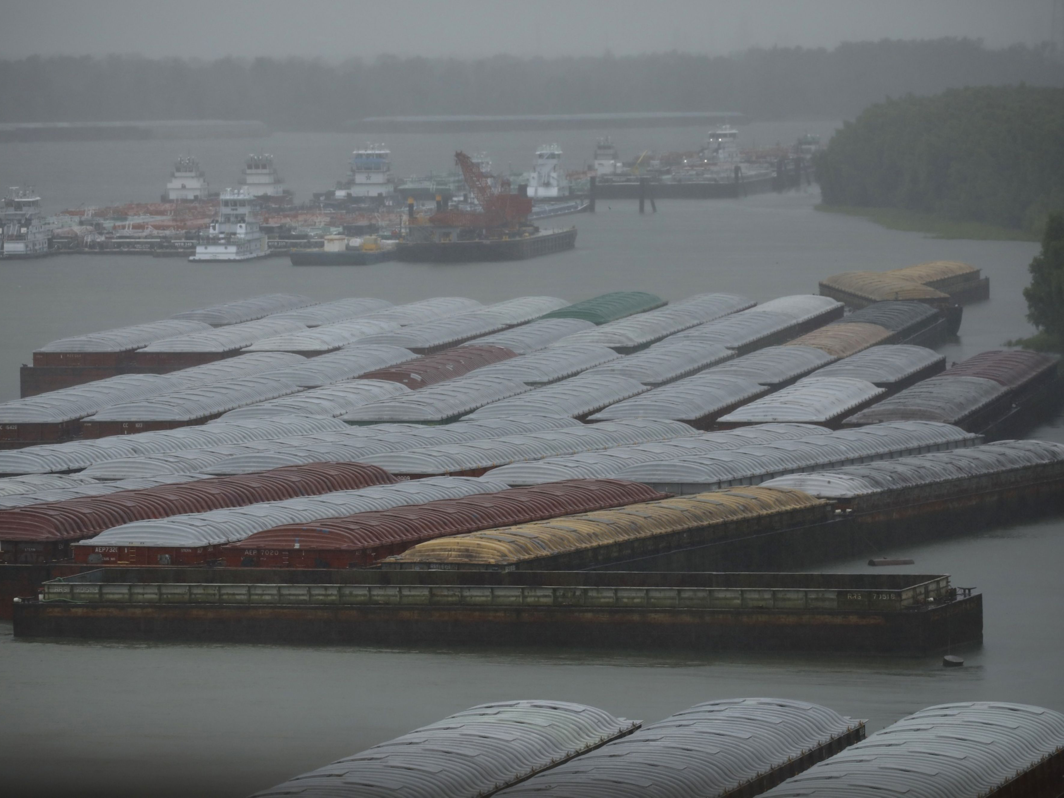 Barges docked on the Mississippi River as Hurricane Ida makes landfall in Destrehan, Louisiana. Photo: Bloomberg.