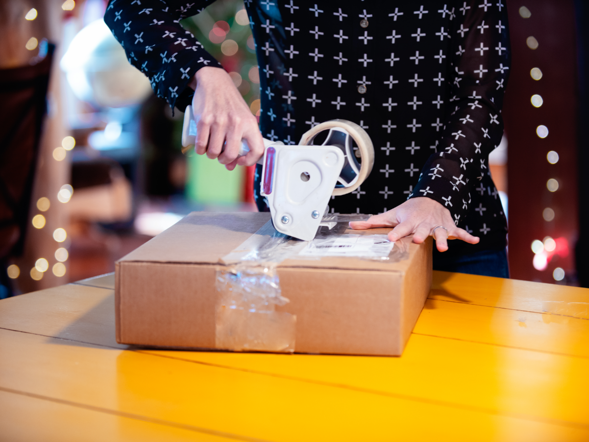 A customer repackages an item for return. Photo: Getty Images.
