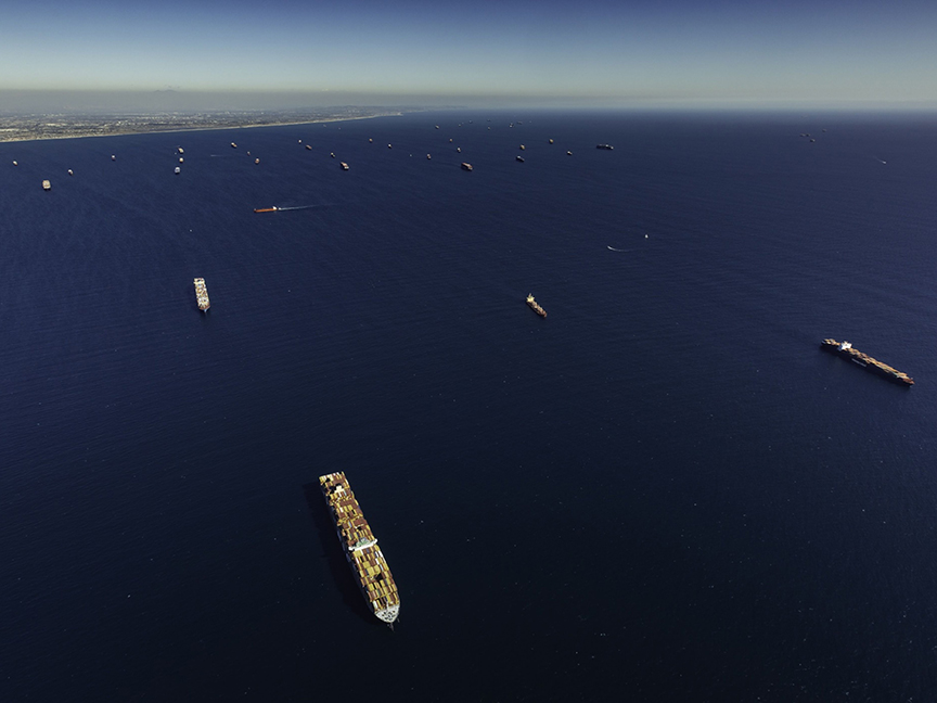Container ships moored off the Los Angeles and Long Beach ports in Long Beach, California. Photo: Bloomberg.
