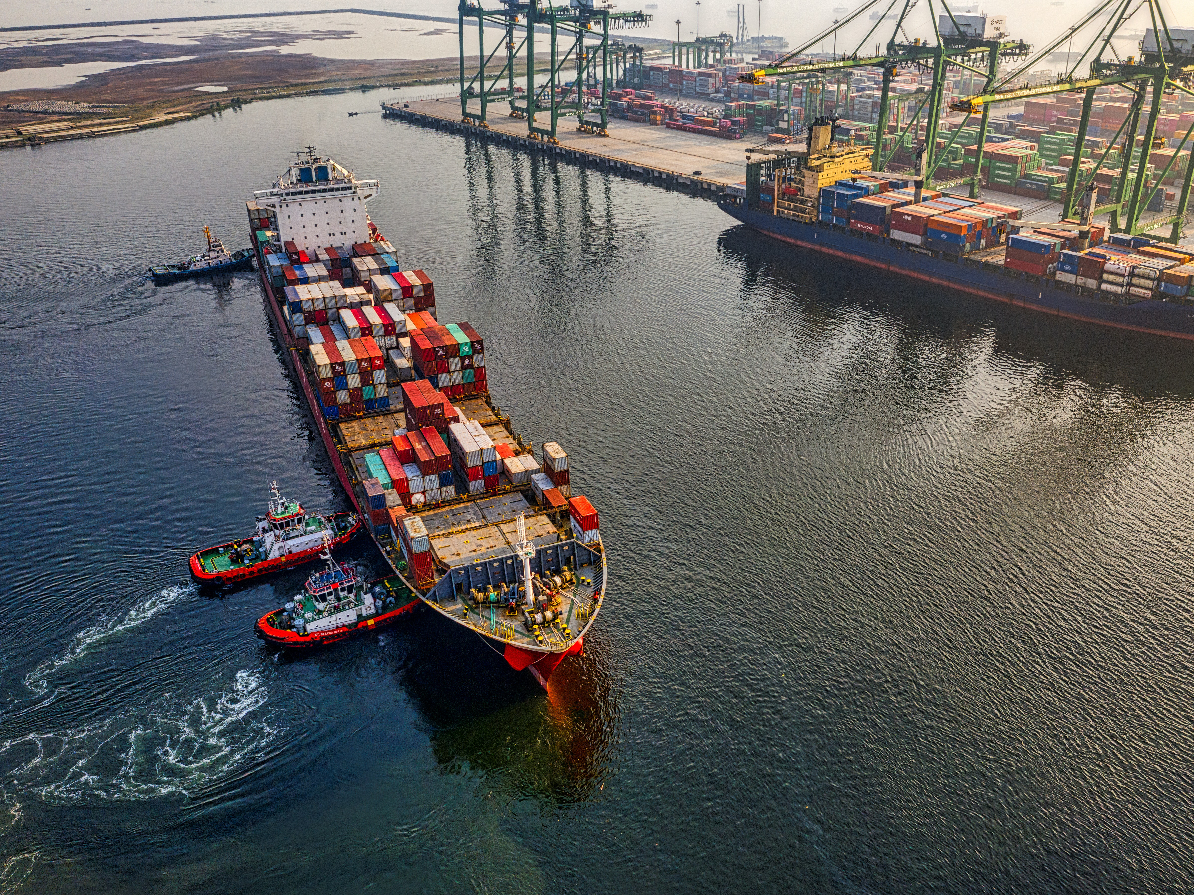A cargo ship is docked off the coast of North Jakarta, Indonesia. Photo: Tom Fisk/ Pexels.