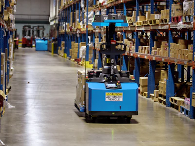 A Seegrid Corp. autonomous mobile robot navigates a warehouse. Photo: Seegrid.
