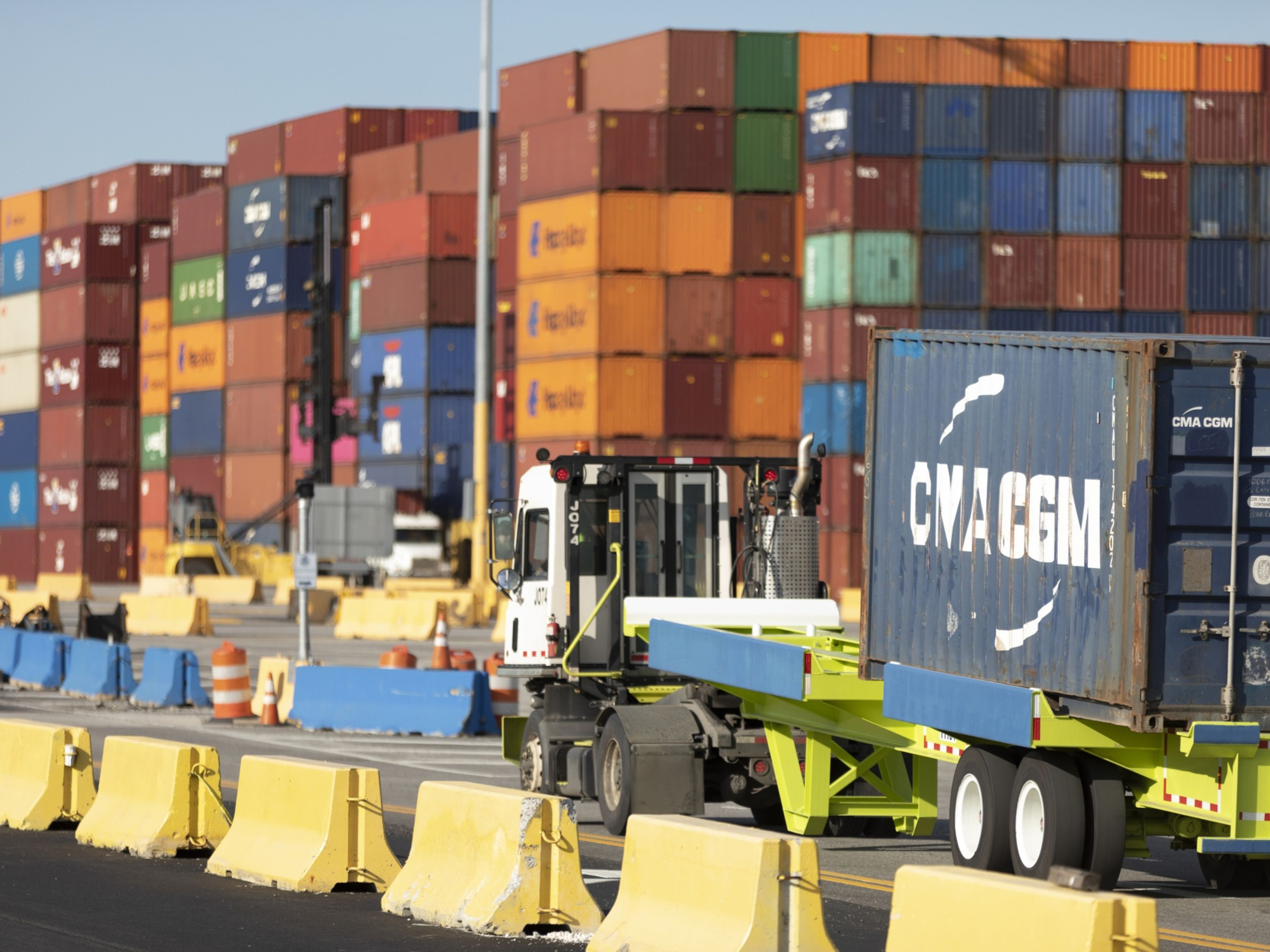 A truck carries a shipping container at the Georgia Port Authority Mason Mega Rail Terminal in Garden City, Georgia. Photo: Bloomberg.