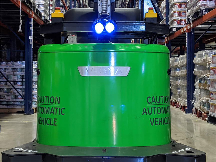 An autonomous material-handling vehicle moves through a warehouse. Photo: Vecna Robotics.