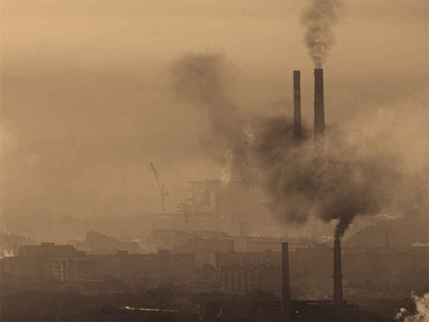 Smoke rises from cooling towers at a power station. Photo: Getty Images.