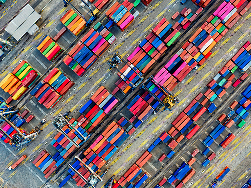 Containers stacked at a shipping terminal. Photo: Tom Fisk/ Pexels.