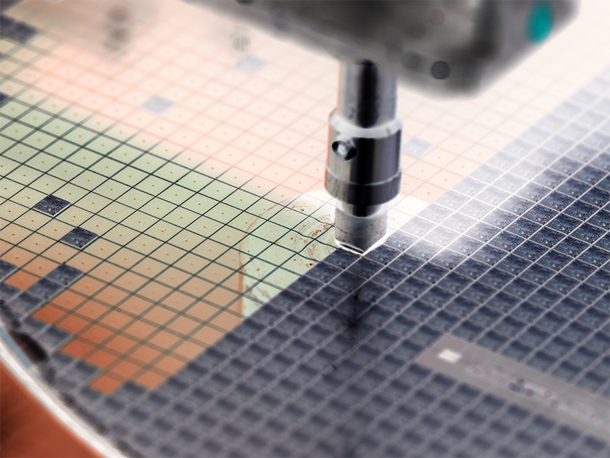 A detail of a silicon wafer is shown on the production line. Photo: Getty.