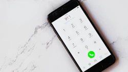Universal emergency number '9-1-1' is shown on a smartphone keypad. Photo: Oleg Magni/ Pexels.