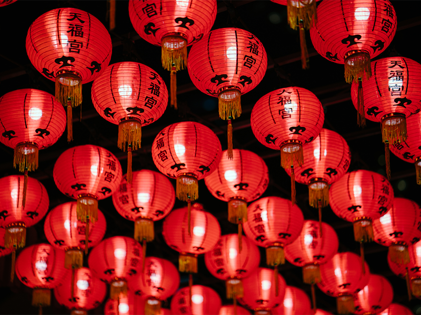 Red lanterns are illuminated at night for the Lunar New Year. Photo: Pexels.