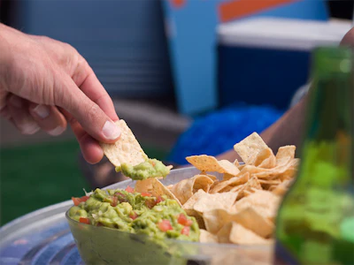 Chips and guacamole. Photo: Getty.
