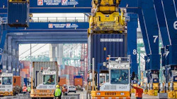 Dockworkers move cargo on a container terminal. Photo: Port of Los Angeles.