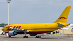 A DHL cargo plane at the airport. Photo: Getty.
