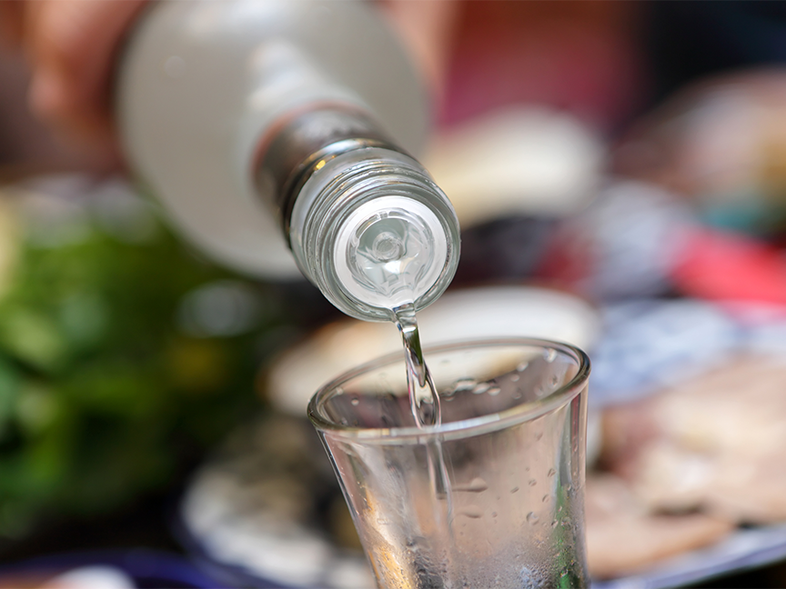 Vodka is poured into a glass. Photo: Getty.