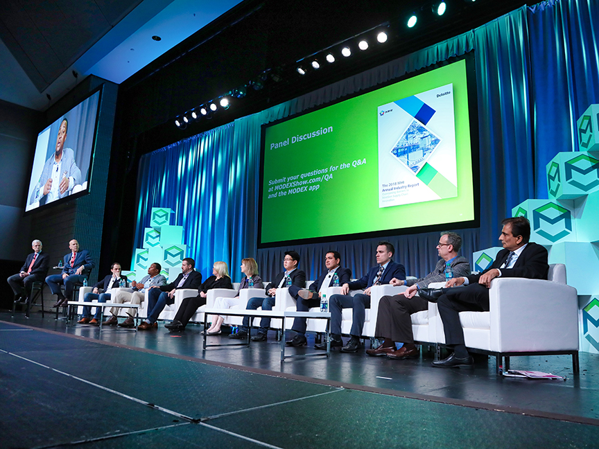 Panelists sit on stage during an educational seminar at MODEX 2019. Photo: MHI.