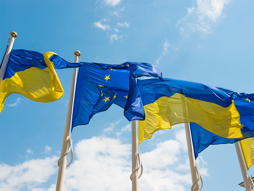 Ukraine and European Union flags stand in a row. Photo: Getty.