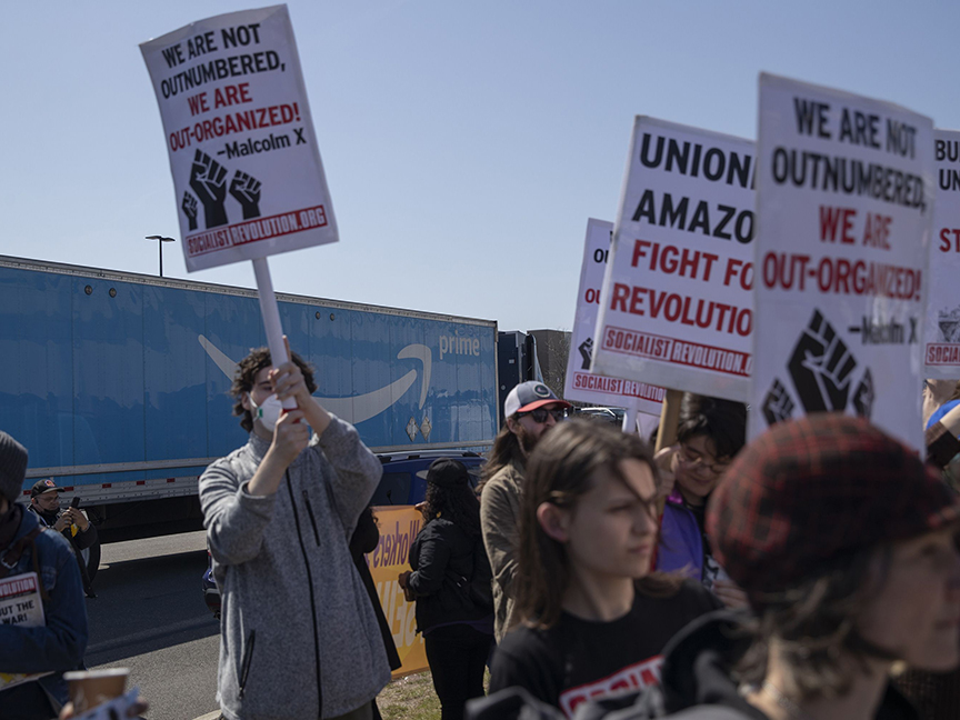 An Amazon truck drives past an Amazon Labor Union (ALU) rally in the Staten Island borough of New York. Photo: Bloomberg.