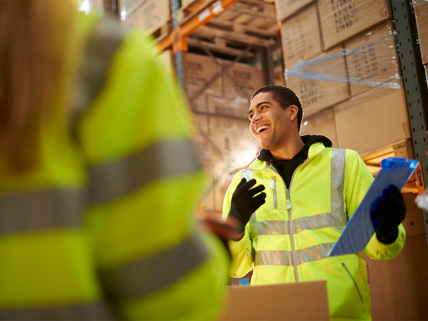 Warehouse employees at work. Photo: Getty.