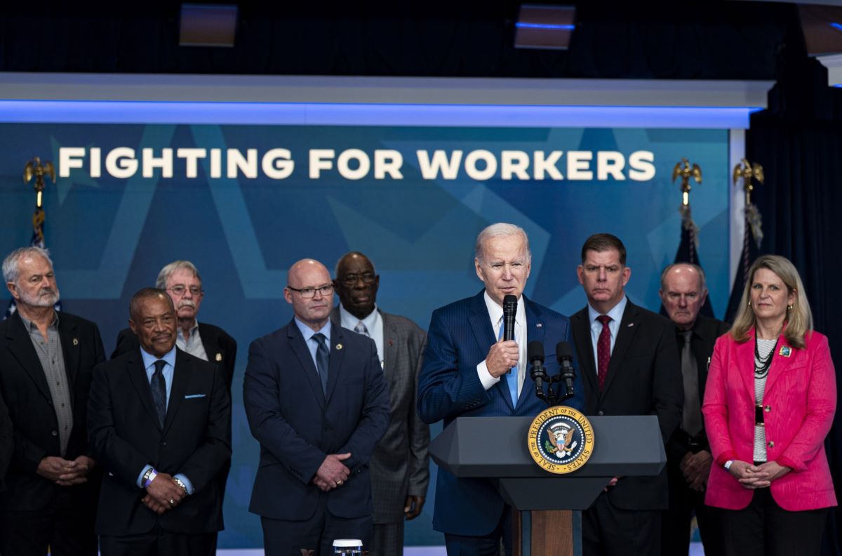 Joe Biden speaks in the Eisenhower Executive Office Building in Washington, DC, on December 8. Photo: Bloomberg