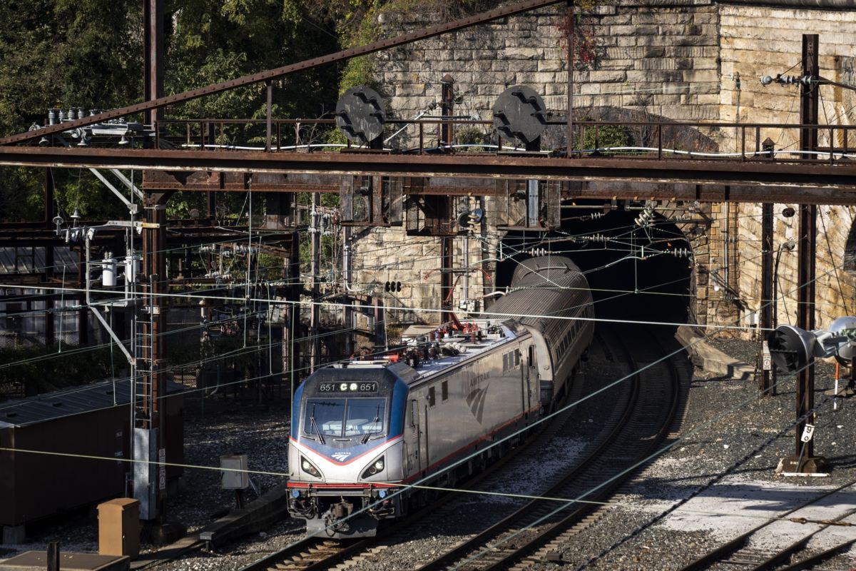 An Amtrak train exits the Baltimore and Potomac Tunnel. Photographer: Drew Angerer/Getty Images