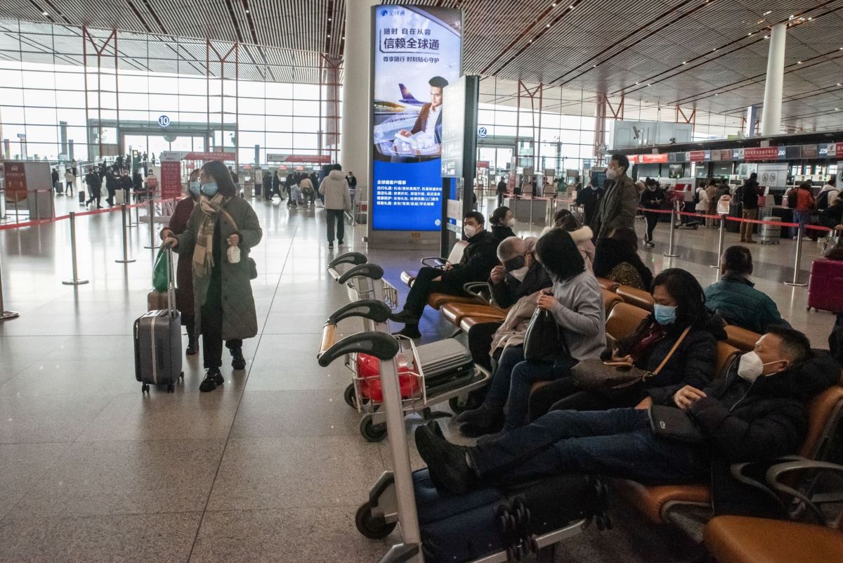Travelers at Beijing airport on Jan. 14. Domestic travel is expected to rebound faster than international. Photo: Bloomberg