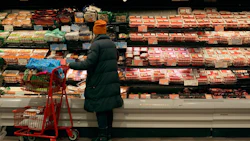 A woman at the grocery store.