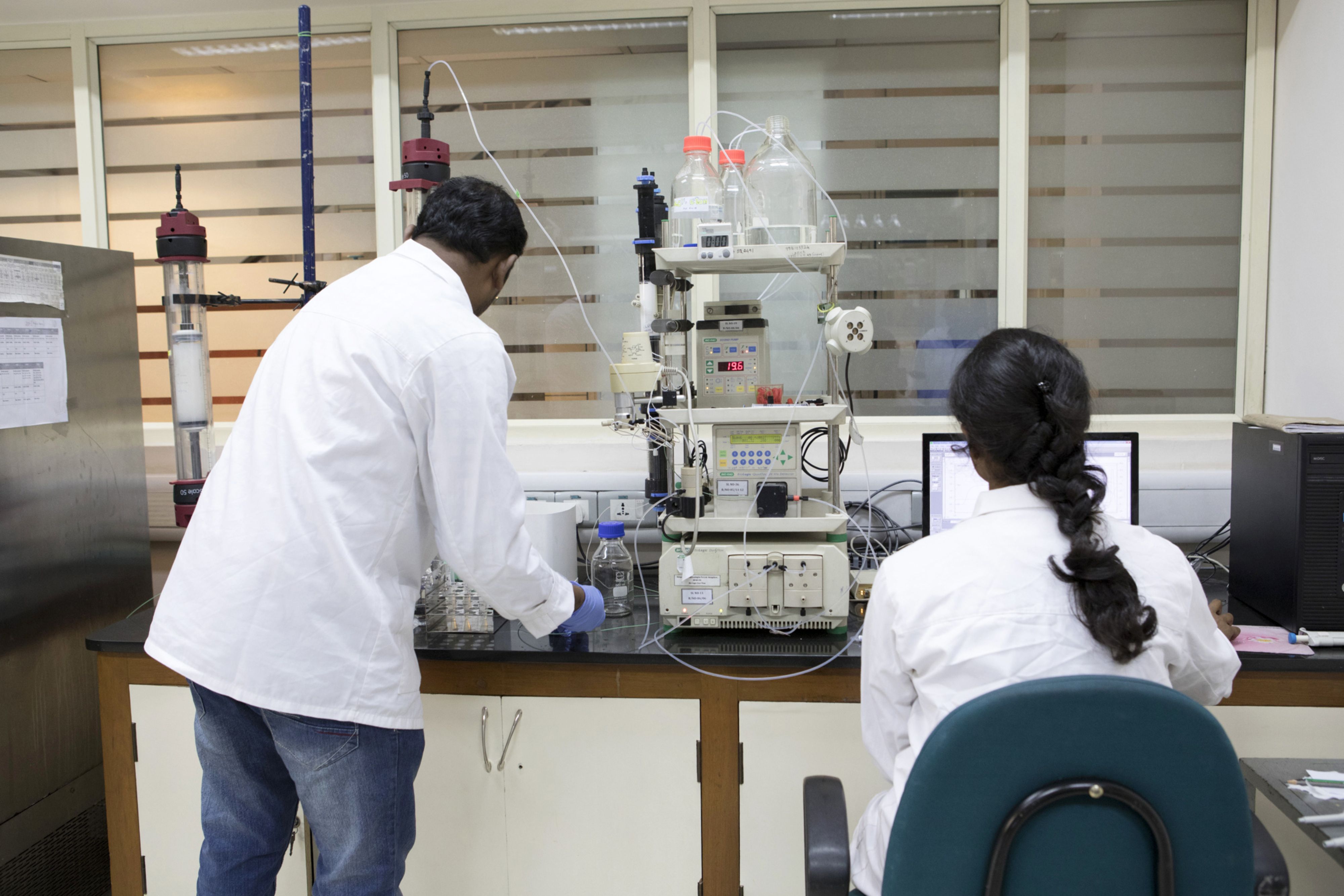 Technicians use a protein purification unit at a GangaGen Inc. laboratory in Bengaluru, India, on Wednesday, May 30, 2018. The rapid spread of resistant bacteria has made India the epicenter of a war to prevent a post-antibiotic world, where people would once again die in their thousands of commonplace infections. Faced with this, the Indian government has begun to act, providing early research funding to startups like GangaGen and providing advice and support.
