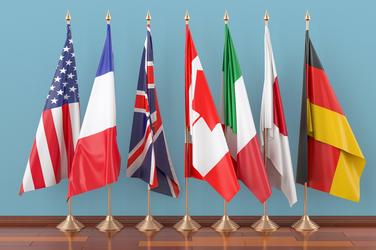 Flags of all members of the G7 Group, 3D rendering. Photo: iStock.com/AlexLMX