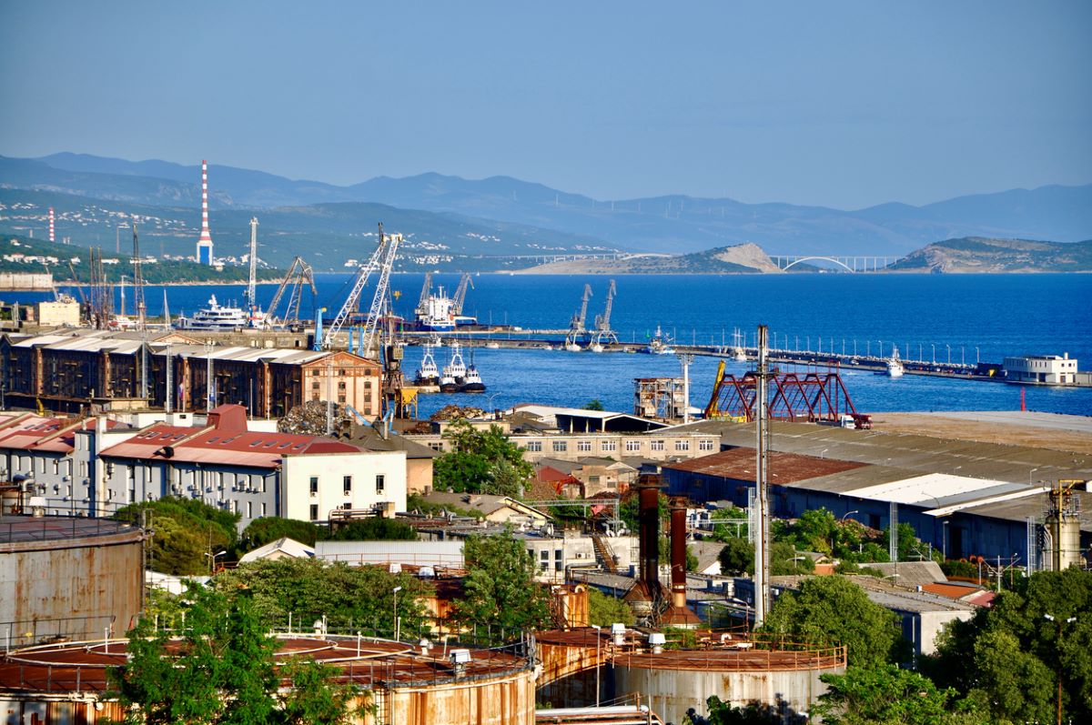 The industrial and port city of Rijeka, with Krk bridge in the background. Photo: iStock.com/Marilena Dragoslavic