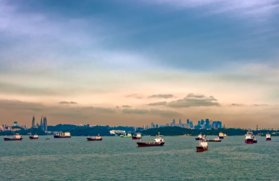 Cargo ships waiting in Singapore Harbor. Photo: iStock.com/IgorSPb