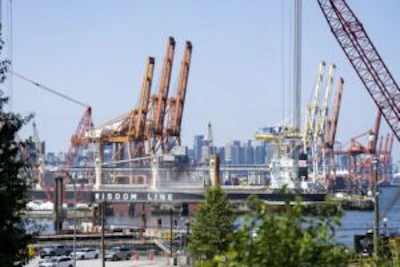 Ships at the Port of Vancouver during a dockworkers strike on July 5. Photographer: Jimmy Jeong/Bloomberg