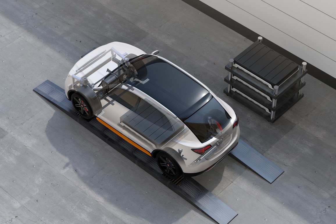 An electric SUV car using a battery swapping station. Image: iStock.com/Chesky_W