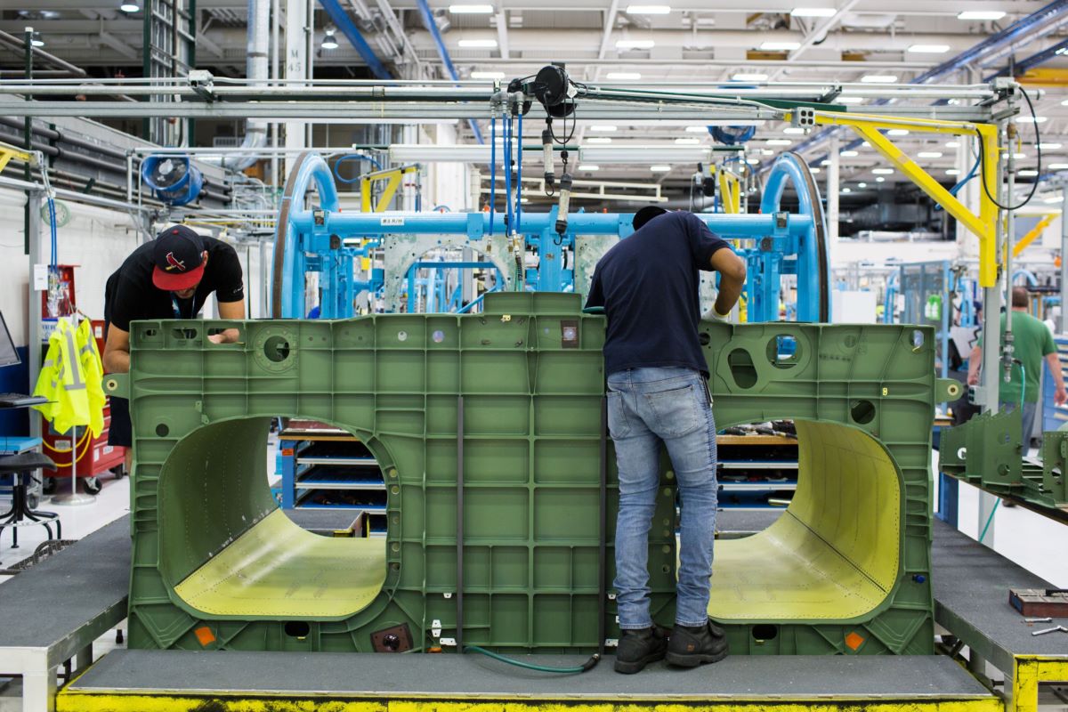 Employees work on the assembly line at the Boeing Defense, Space & Security facility in St. Louis, Missouri. Photographer: Alex Flynn/Bloomberg