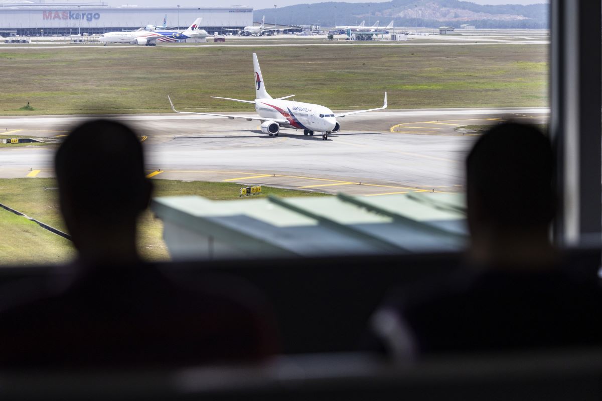 A Malaysia Airlines passenger jet at Kuala Lumpur International Airport. Photographer: Richard Humphries/Bloomberg