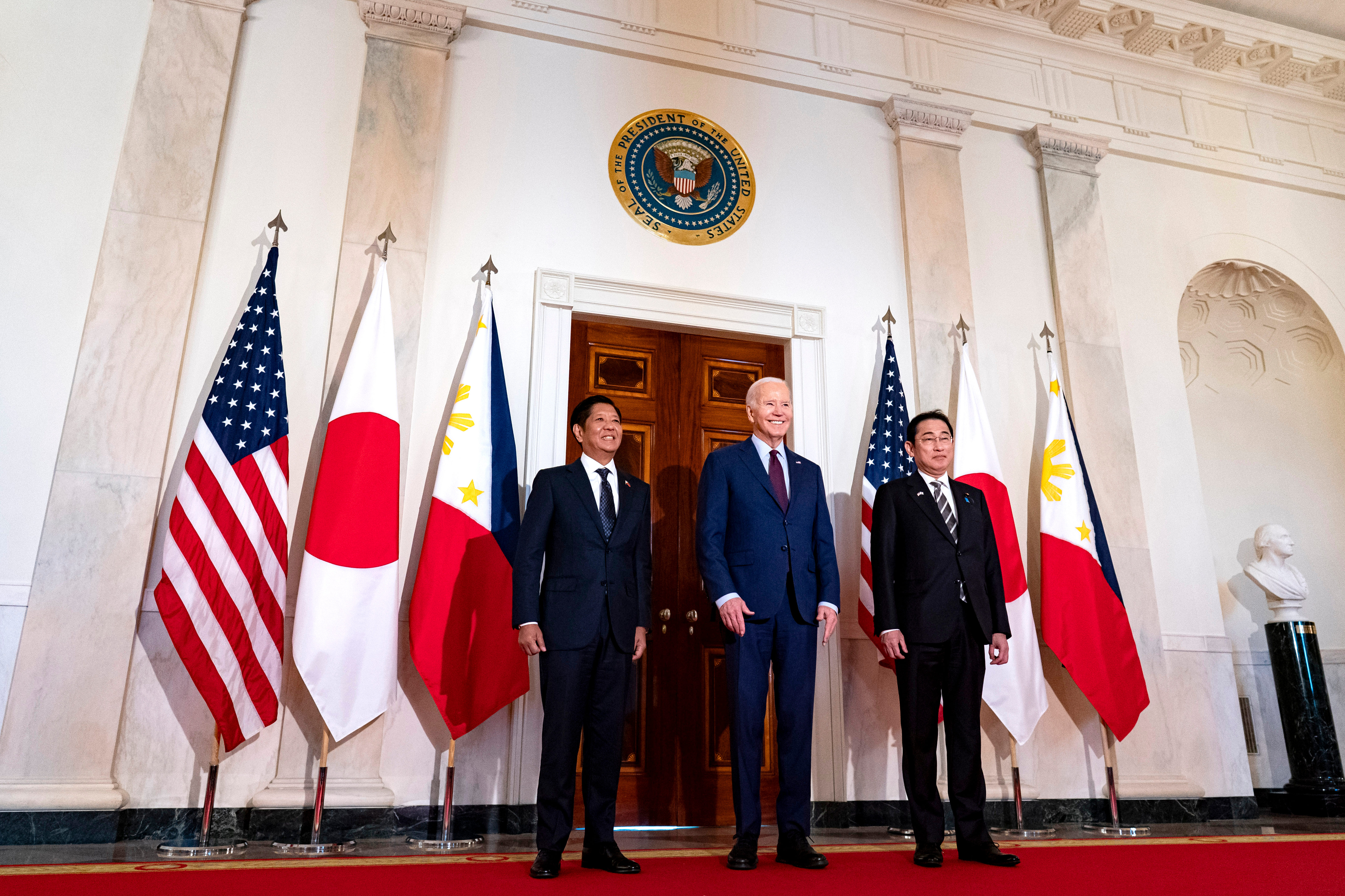 Ferdinand Marcos Jr., left, Joe Biden and Fumio Kishida at the White House. Photographer: Al Drago/Bloomberg