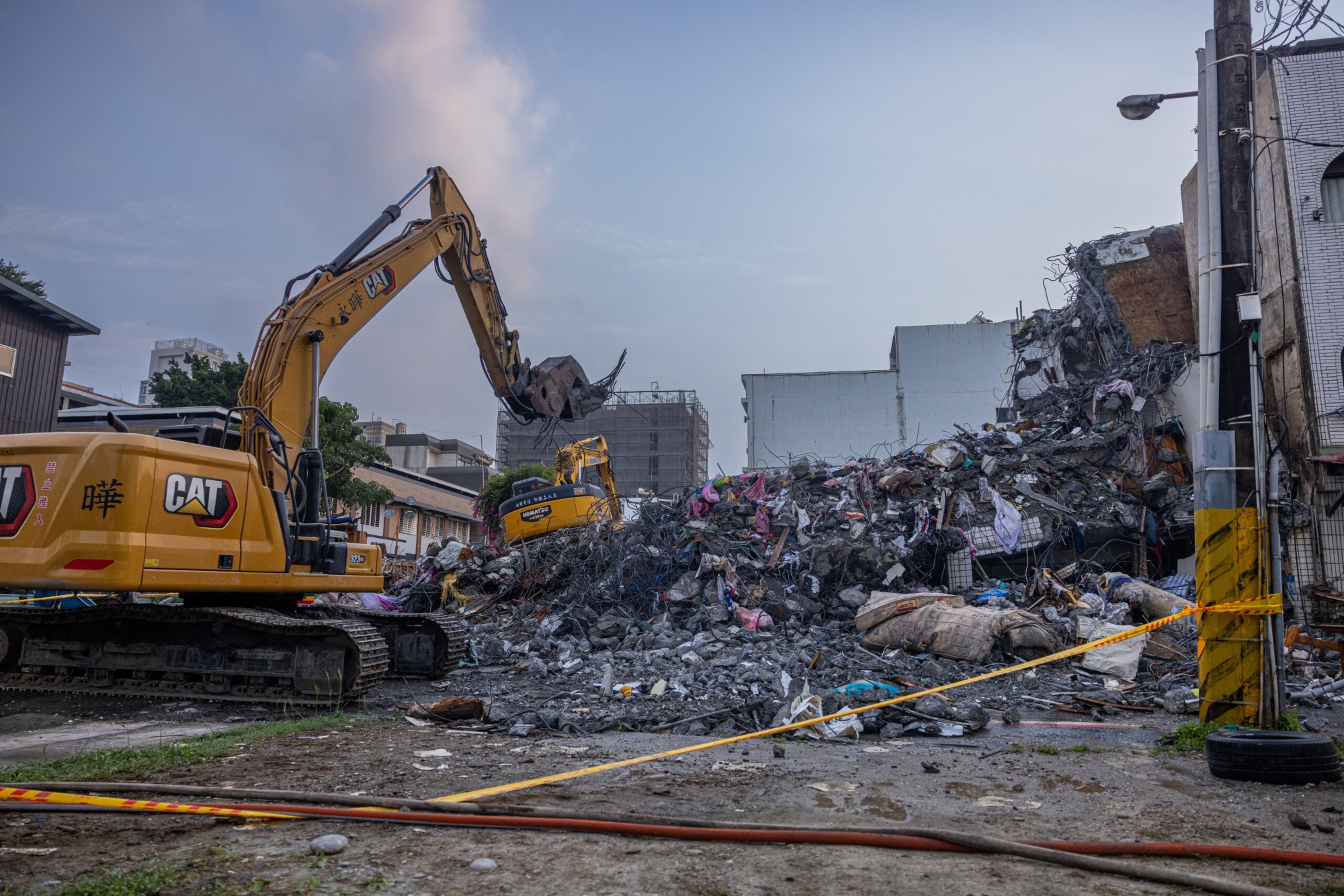 Rescue teams demolish a collapsed building following the earthquake in Hualien on April 4.