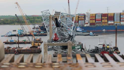 Salvors continue to remove debris from the wreckage site of the Francis Scott Key Bridge collapse as seen from the edge of the remaining bridge that still stands April 17. Debris and wreckage removal is on-going in support of a top priority to safely and efficiently open the Fort McHenry channel. Photo: U.S. Army Corps of Engineers, Baltimore District