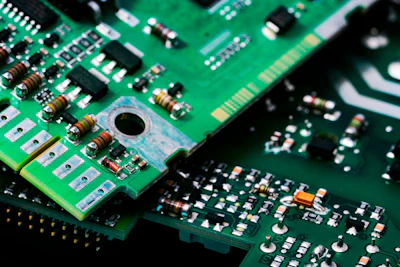 Electronic circuit board. Semiconductor motherboard circuit board technology. Mainboard of computer. Integrated semiconductor microchip on green circuit board. Hi-tech industry and computer science.
