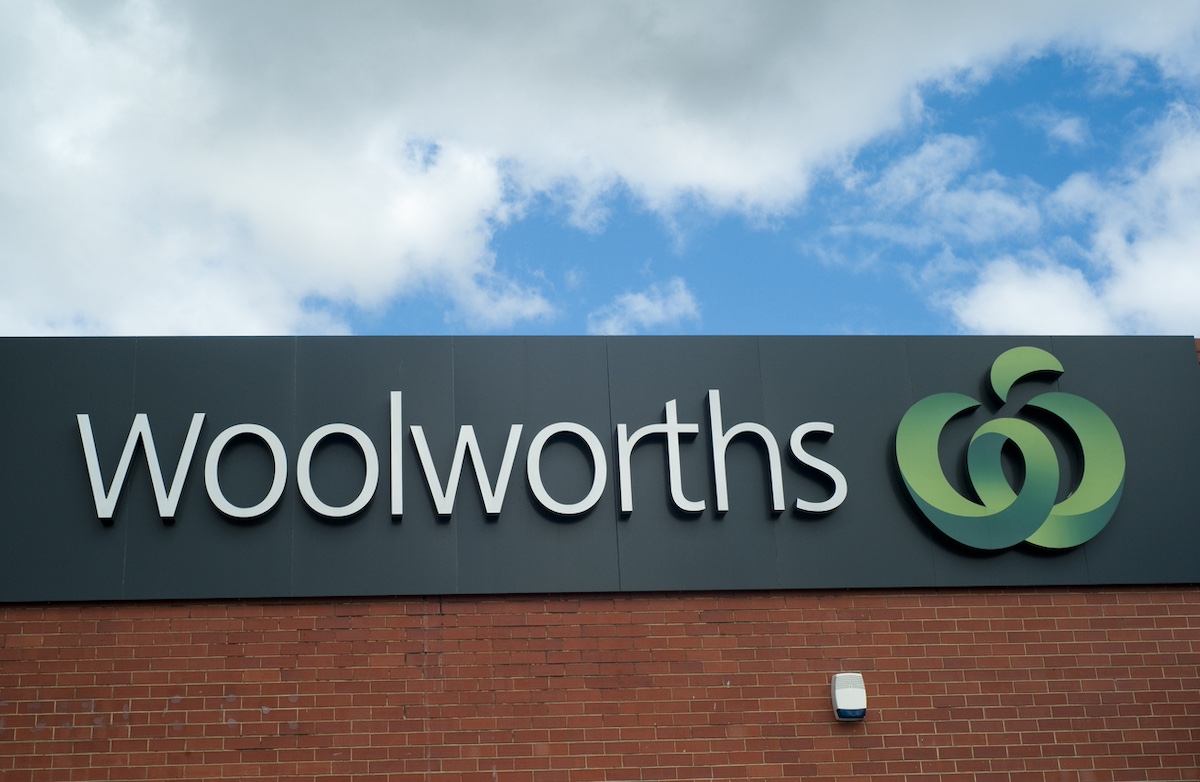 Adelaide, Australia - March 25th, 2012: A large sign on top of a building for the Woolworths supermarket chain.
