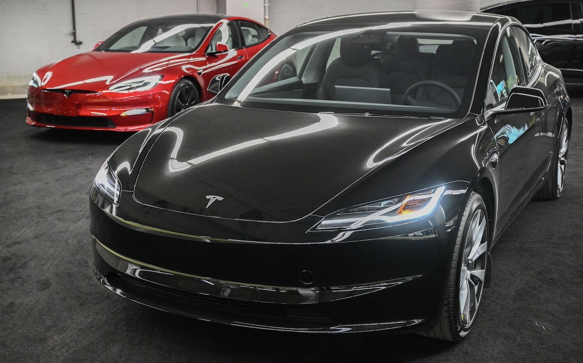 A 2024 Tesla Model 3 during the Montreal Electric Vehicle Show in Montreal. Photographer: Graham Hughes/Bloomberg