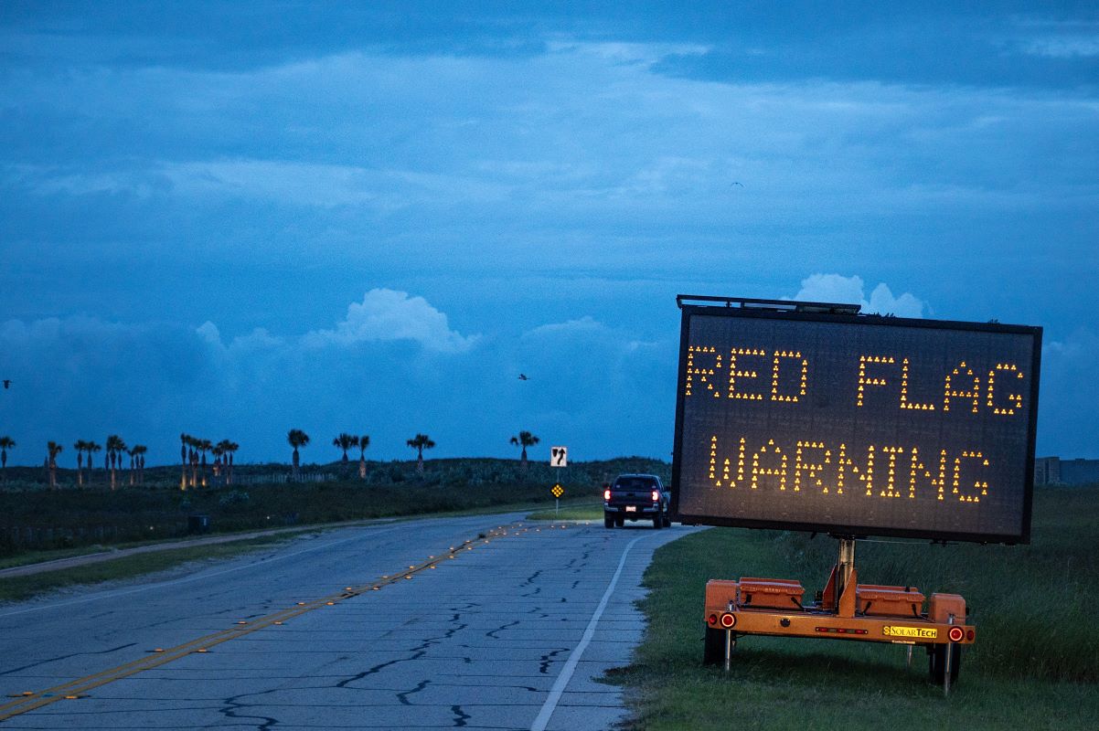 A warning sign on a North Padre Island beach access road ahead of Hurricane Beryl’s landfall in Corpus Christi, Texas. Photo: Bloomberg