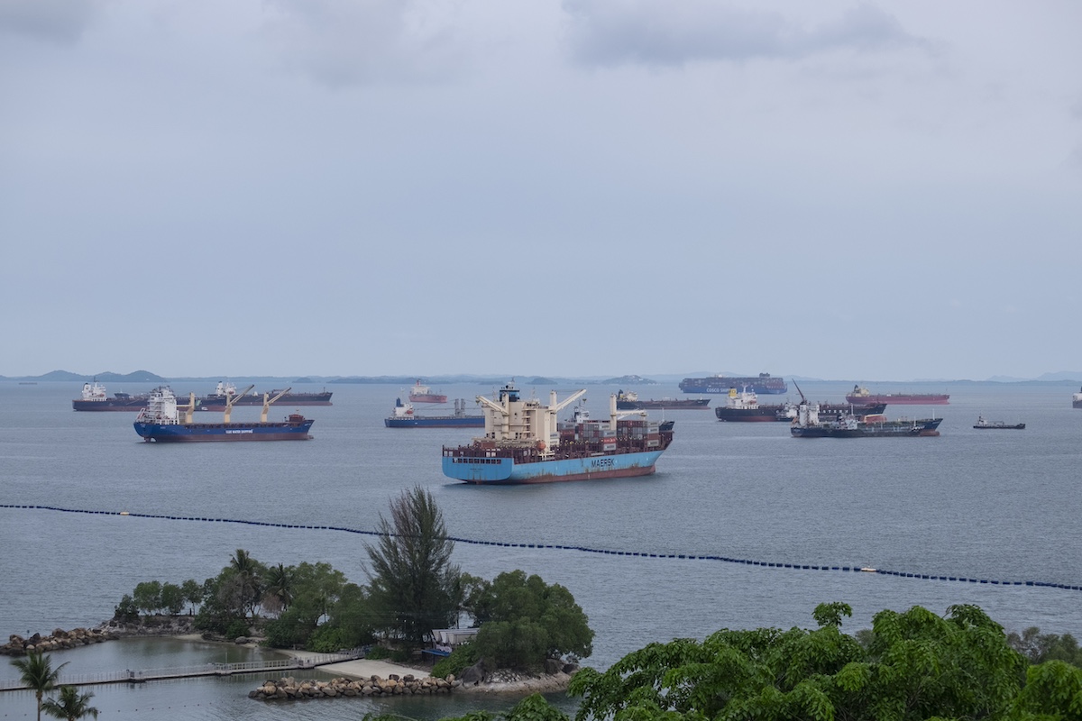 Ships anchored around the Sentosa Island in Singapore, on Thursday, June 13, 2024. Singapore's port, already one of the busiest in the world, is facing a sustained period of congestion as vessel diversions to avoid the Red Sea push more container ships to the Asian maritime hub. Photographer: Aparna Nori/Bloomberg