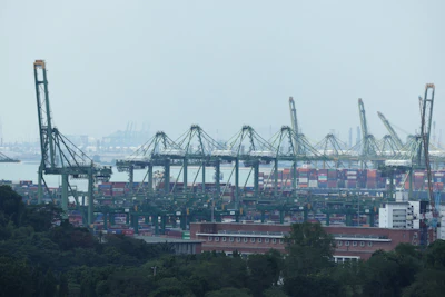 The Pasir Panjang port terminal in Singapore, on Tuesday, Jan. 3, 2023. Singapore's recovery held up in 2022, with a relatively strong year-end performance shoring up the economy ahead of an expected global slowdown this year. Photographer: Lionel Ng/Bloomberg