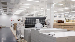 Technicians perform a final inspection of a solar panel prior to packaging at Irex Energy JSC's manufacturing facility in Vung Tau, Vietnam. Photo: Yen Duong/Bloomberg.