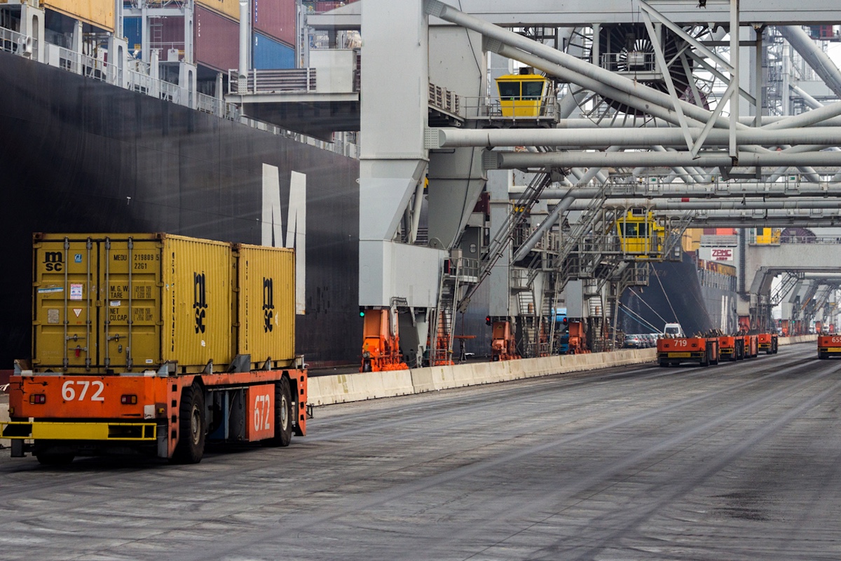 Automated Guided Vehicles moving shipping containers at the Port of Rotterdam. Photo: iStock / VanderWolf-Images