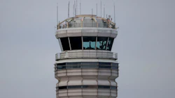 The air traffic control tower at Ronald Reagan Washington National Airport (DCA) in Arlington, Virginia. Photographer: Tierney L. Cross/Bloomberg