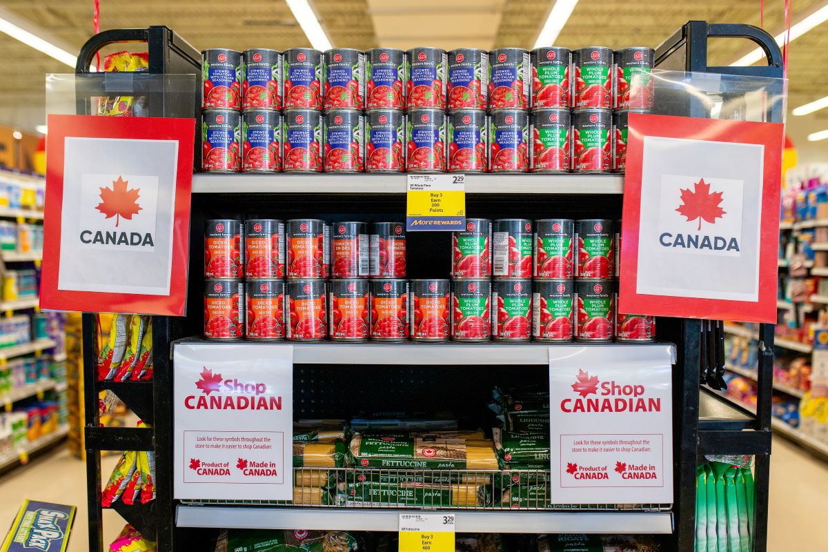 'Shop Canadian' signs on grocery store shelves in Victoria, Canada. Photographer: James MacDonald/Bloomberg