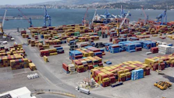 Ship-to-shore cranes and shipping containers at the commercial Port of Izmir, also known as Alsancak Port. Photo: Moe Zoyari / Bloomberg